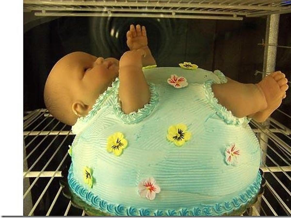 Tort na baby shower z głową dziecka