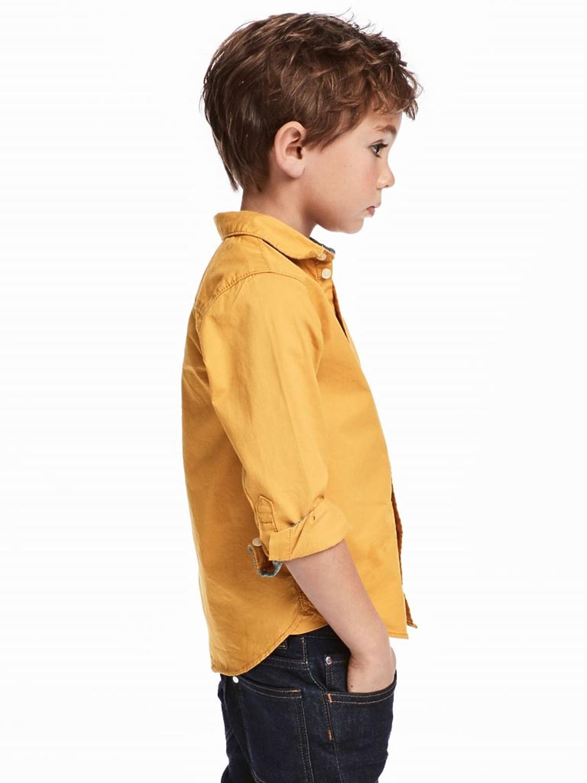 żółta koszula i jeansy dla chłopca H&M